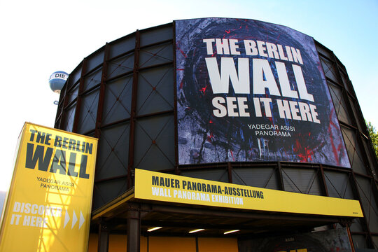 Exterior of The Berlin Wall Panorama Exhibition by Yadegar Asisi with Bold Signage