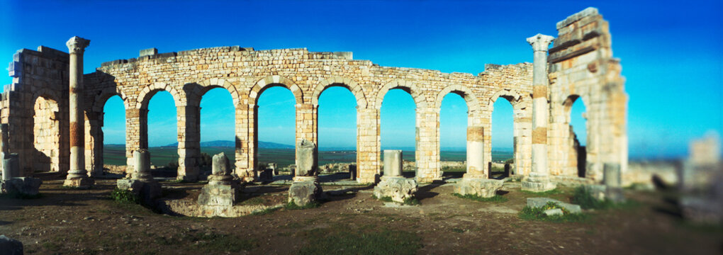 Panoramic view of ncient Roman ruins at an archaeological site, Volubilis, Morocco.