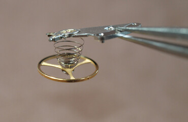 vintage mechanical watch balance wheel close up detail