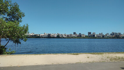 Rio de Janeiro skyline landscape city urban lagoon forest stone rock mountain hill vegetation nature green tree bird heron sky blue water park garden vacation beautiful path wood land asphalt deck