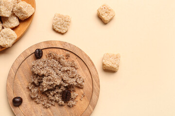 Wooden board with body scrub and cane sugar on color background