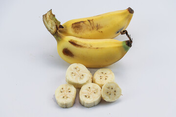 A Whole Banana with Slices in Front View