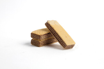 stack of sweet chocolate wafer snacks isolated on white background