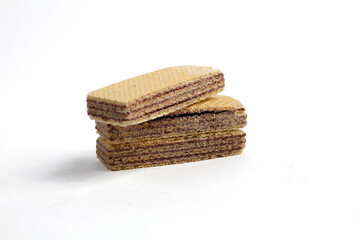 stack of sweet chocolate wafer snacks isolated on white background