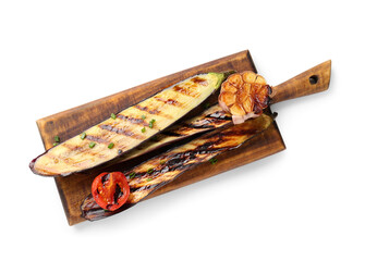 Board with delicious grilled eggplants, garlic and tomato on white background, top view
