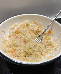 A Truly Delicious and Appealing Plate of Noodles, Garnished with Fresh Vegetables and Herbs