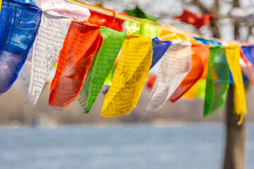 Colorful Tibetan flags. Prayer flags of yellow, white, blue, green and red color symbol of elements...