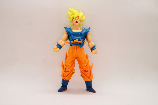 Goku Super Saiyan action figure from the Dragon Ball anime on a white background isolated	