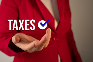 A woman is holding a hand up to a check mark that says 