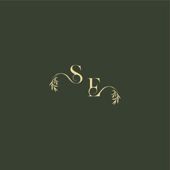 logo design concept luxury wedding monogram SE organic leaf initial letter