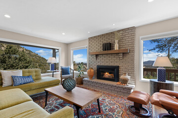 A cozy living room with a fireplace and flat screen TV for entertainment