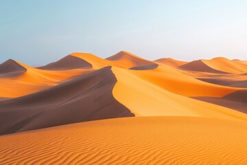 Sand dunes desert landscape golden hour lighting and negative space