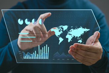 A person interacts with a futuristic touchscreen display presenting global data and analytics,...