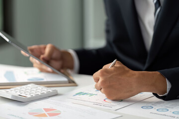 Business Analysis and Reporting. A professional analyzes business data, emphasizing the importance...