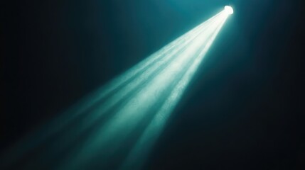 Cinematic spotlight beam shining in deep darkness, creating a dramatic contrast and copy space. No text, no people.