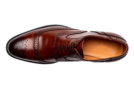 Premium brown leather brogue oxford shoe on transparent background, top view of handcrafted men's formal footwear with decorative perforations, luxury dress shoe with detailed stitching