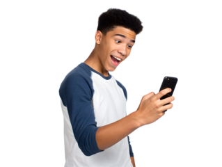 A surprised african american teenager looks at his phone with a wide smile and joyful expression.