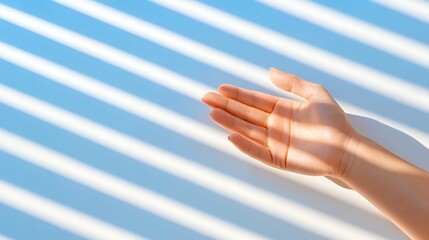 Delicate hand in soft sunlight elegant shadow play