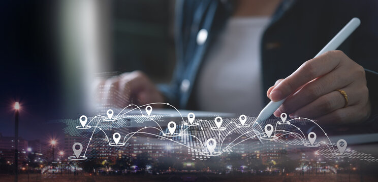 Smart logistics, GPS map, pin address location on mobile apps, global business. Double exposure of business man using digital tablet searching target place and the city with internet network - Powered by Adobe
