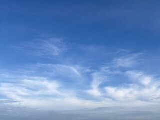 clear blue sky with pure white clouds. The sky was very clear and clouds were scattered everywhere