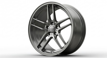 Obraz premium Sleek automotive alloy wheel with a modern design, featuring angular spokes and a polished silver finish against a clean white backdrop.