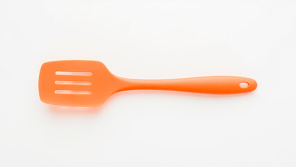 Bright Orange Silicone Spatula on White Background Perfect for Kitchen Utensil Photography and Cooking Projects