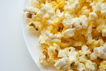 Tasty popcorn close up background top view