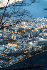 a view of the sunset over Kyoto, Japan