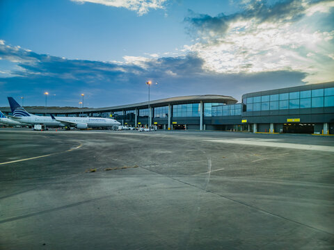 Copa airlines airplane at the gate at Tocumen International Airport, Panama partly cloudy day