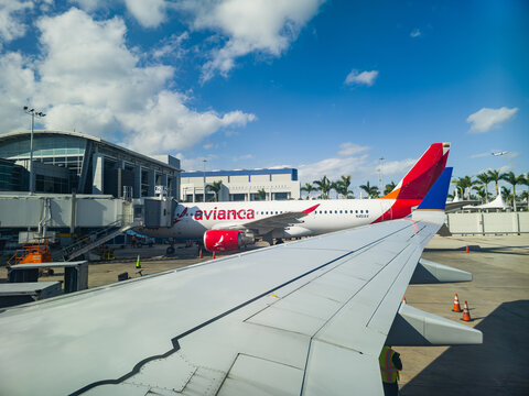 Avianca Airlines airplane waits at gate J2 of Miami International Airport terminal J in Miami, Florida