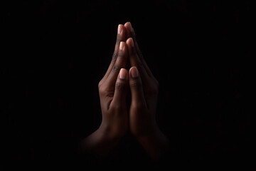 Fototapeta premium persons hands clasped together in prayer
