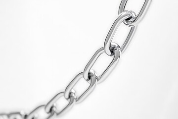 Shiny Silver Metal Chain Links Interlocked on White Background, Security, Strength, Macro