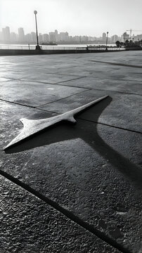 Fototapeta Abstract Metal Arrow Shadow on Urban Ground