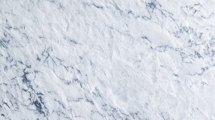 Obraz premium High-resolution and ultra-realistic top view of a white marble texture background showing smooth and elegant surface with fine patterns.