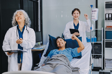 Obraz premium Nurse giving assistance to senior patient with disease in bed. Medical assistant and doctor doing healthcare checkup for pensioner with oxygen tube and IV drip bag in hospital ward.