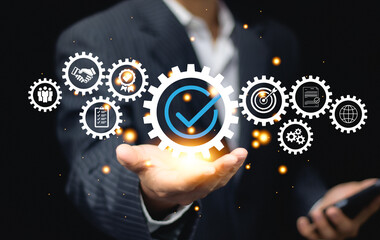 Businessman Hand shows the sign of the top service Quality assurance, Guarantee, Standards, ISO certification and standardization concept. Standard quality control certification assurance concept.