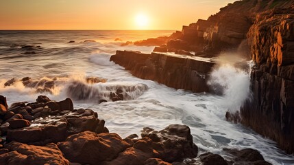Obraz premium Dramatic Ocean Waves Crashing on Rocky Coast at Sunset Stunning Sunrise Seascape
