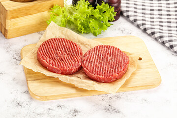 Raw beef  burger cutlet for grill
