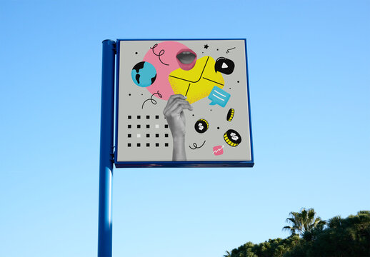 Blank Sign on Blue Pole Against Clear Sky