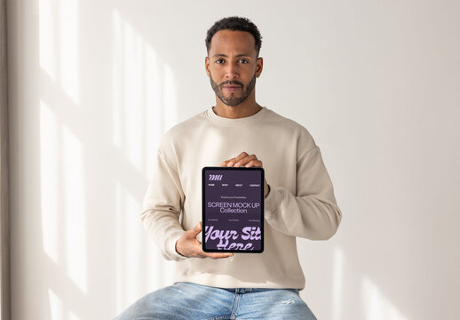 Casual man With Modern Tablet. PSD vertical screen mockup