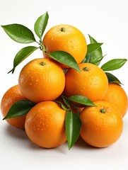A vibrant stack of fresh oranges adorned with green leaves on a clean white background surface view