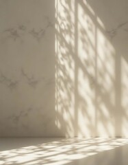 Neutral toned room with intricate botanical shadow casting and marble texture