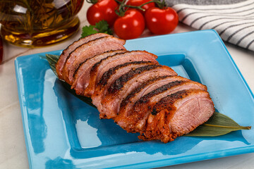 Sliced duck breast baked with cherry
