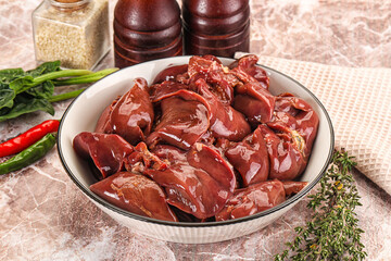 Raw uncokked chicken liver in the bowl