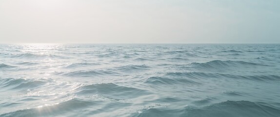 Fototapeta premium Open Ocean Scene with Rippling Water Surface and Hazy Horizon.