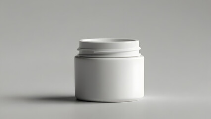 White glossy open cream jar on light backgroun