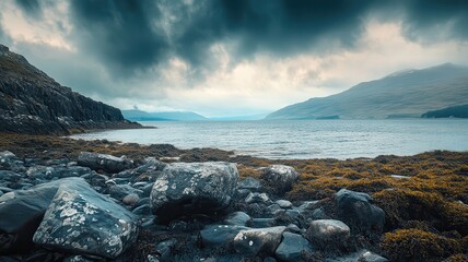 Rocky shore, loch view, dramatic sky, Scotland