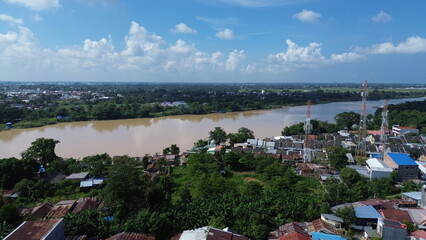 Aerial view of the city with many buildings and housing