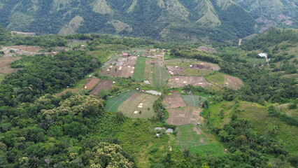 Aerial view of the mountain atmosphere and green trees in the countryside