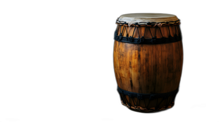 A conga drum placed against a solid black background